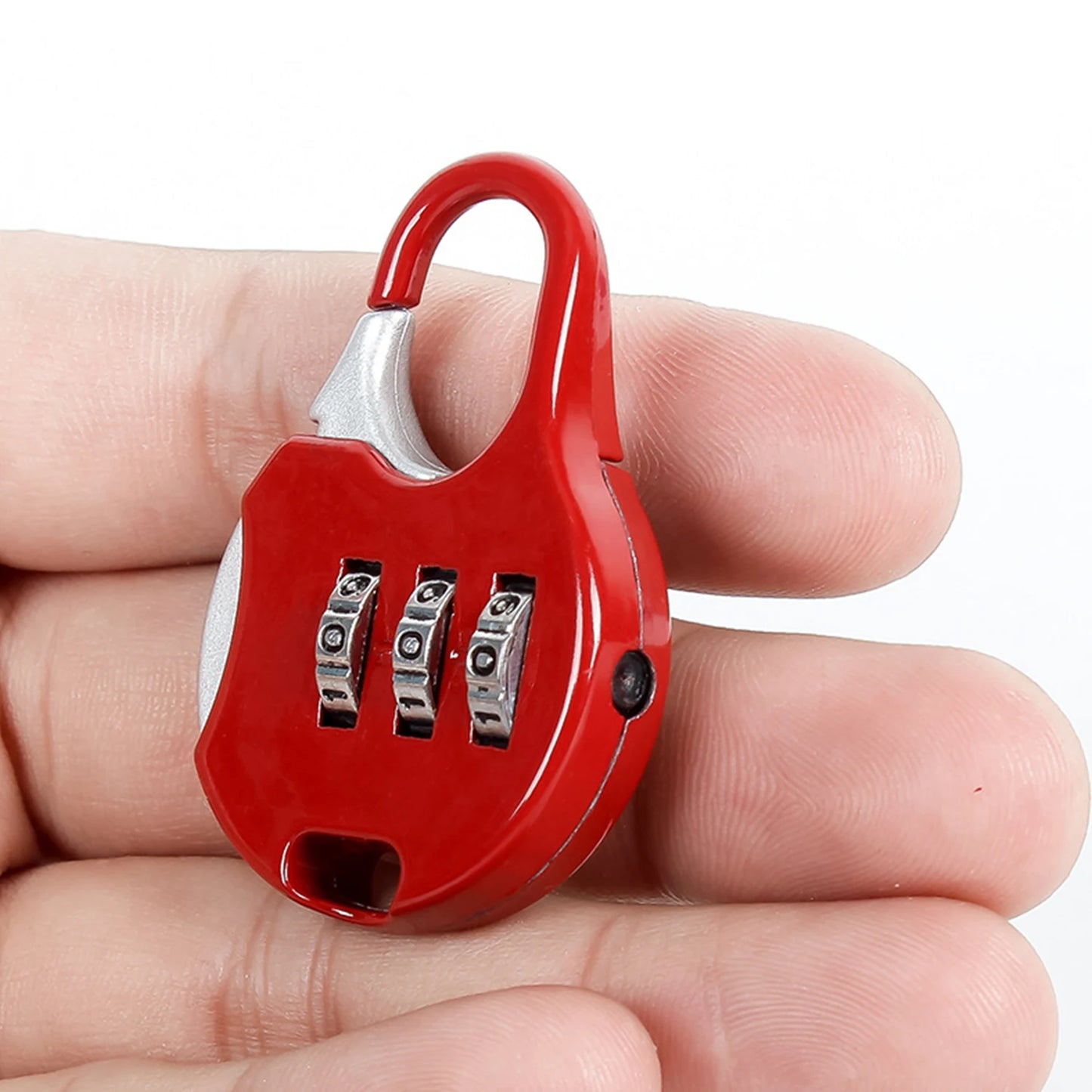 Luggage lock with a 3-digit combination.